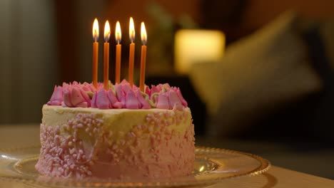 close up of party celebration cake for birthday decorated with icing and candles on table at home 6