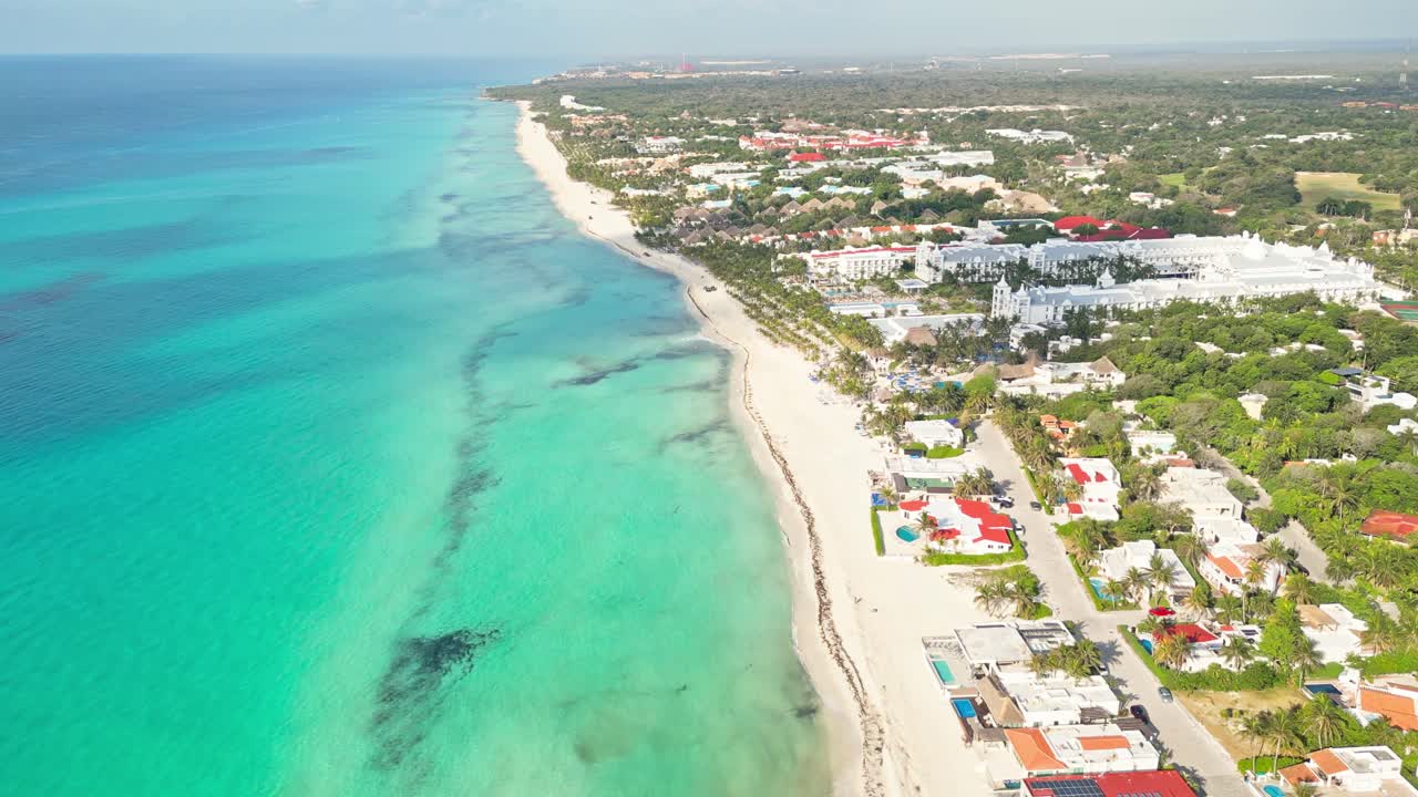 Beach resorts in sunny playa del carmen with turquoise sea vibes, aerial view