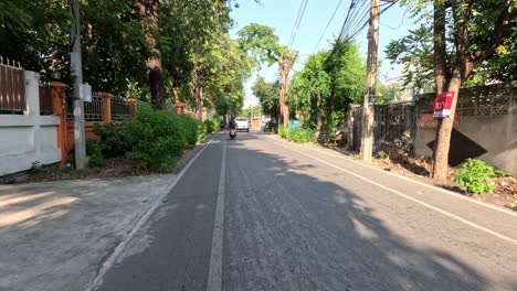 a vehicle's perspective of a suburban road journey