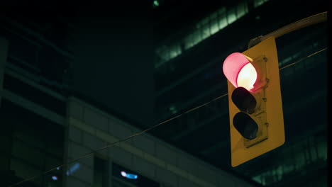 Traffic-Light-Against-Background-Of-Skyscrapers