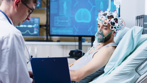 patient with brain injury reading from a clipboard in neurology research center