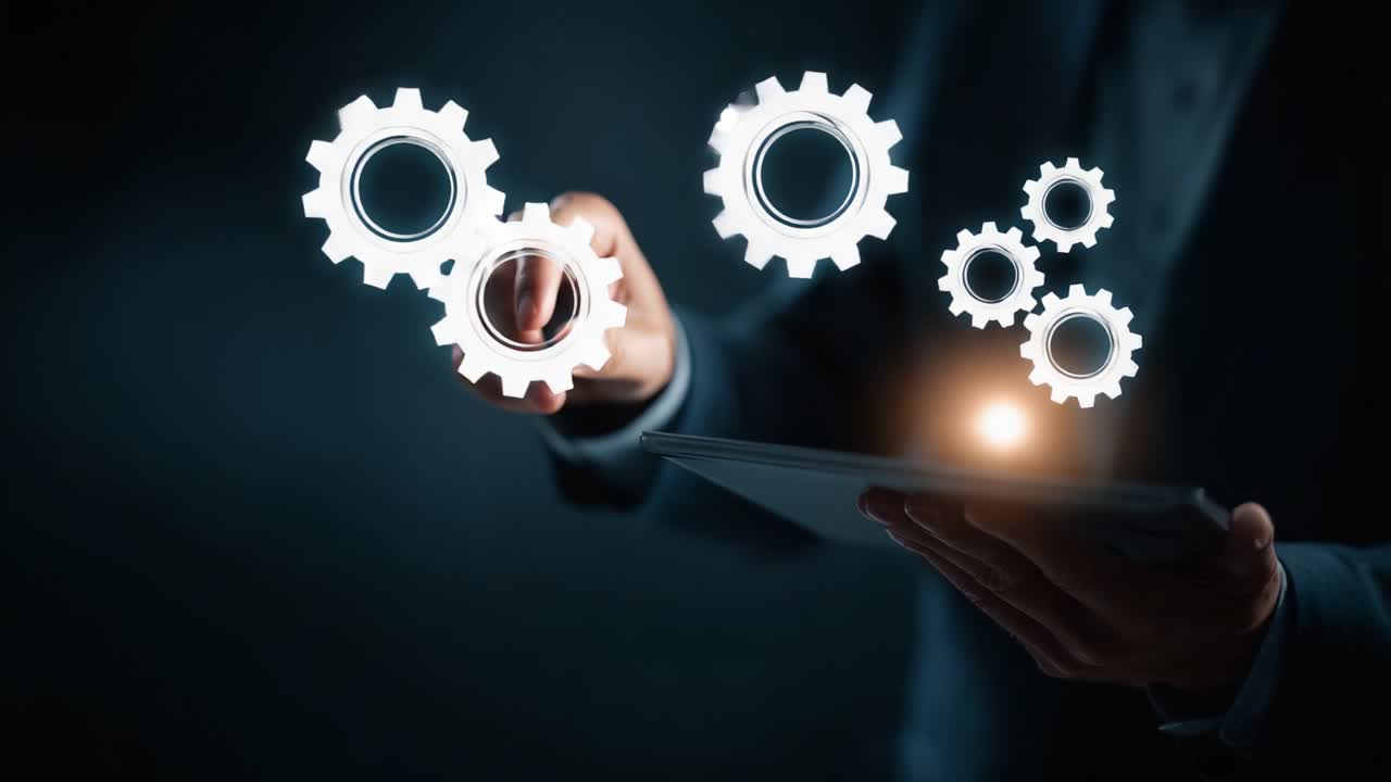 A Focus on Innovation: Hands Engaging with Digital Gears Representing Modern Technology and Automation in a Dark, Futuristic Setting