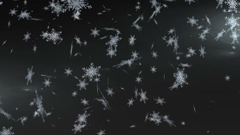 copos de nieve cayendo contra un fondo negro