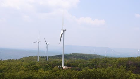 wind turbines rotating in a natural landscape