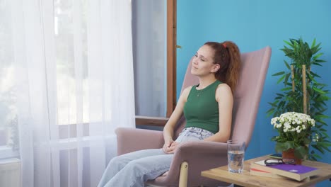 emotional woman watching outside the window.