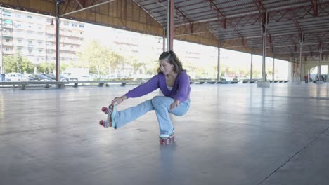 two women roller skating in an outdoor urban space