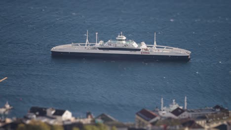 a big ferry passing near the molde port