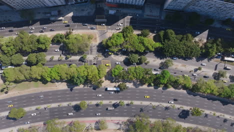 Static-overhead-aerial-footage-of-the-road-of-Botafogo-Bay-in-Rio-de-Janeiro-with-cars-and-buses-driving-by