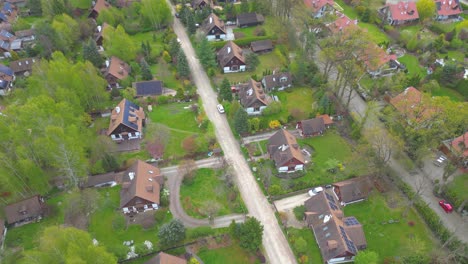 aerial photo of village of houses residential drone above view summer blue sky estate agent