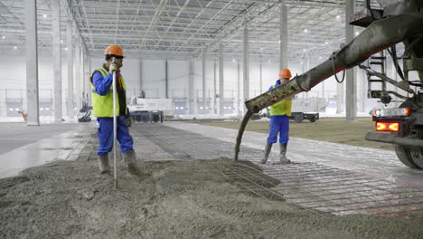 concrete pouring in a large industrial facility