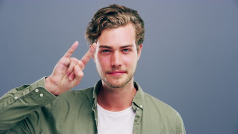 young man portrait with peace sign