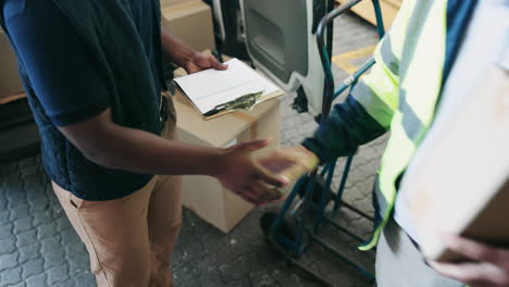 delivery man shaking hands with a customer after delivering a package