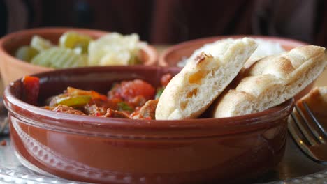 turkish cuisine meal with pita bread and vegetables