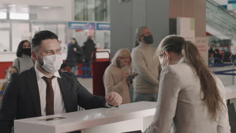 passengers at check-in counter