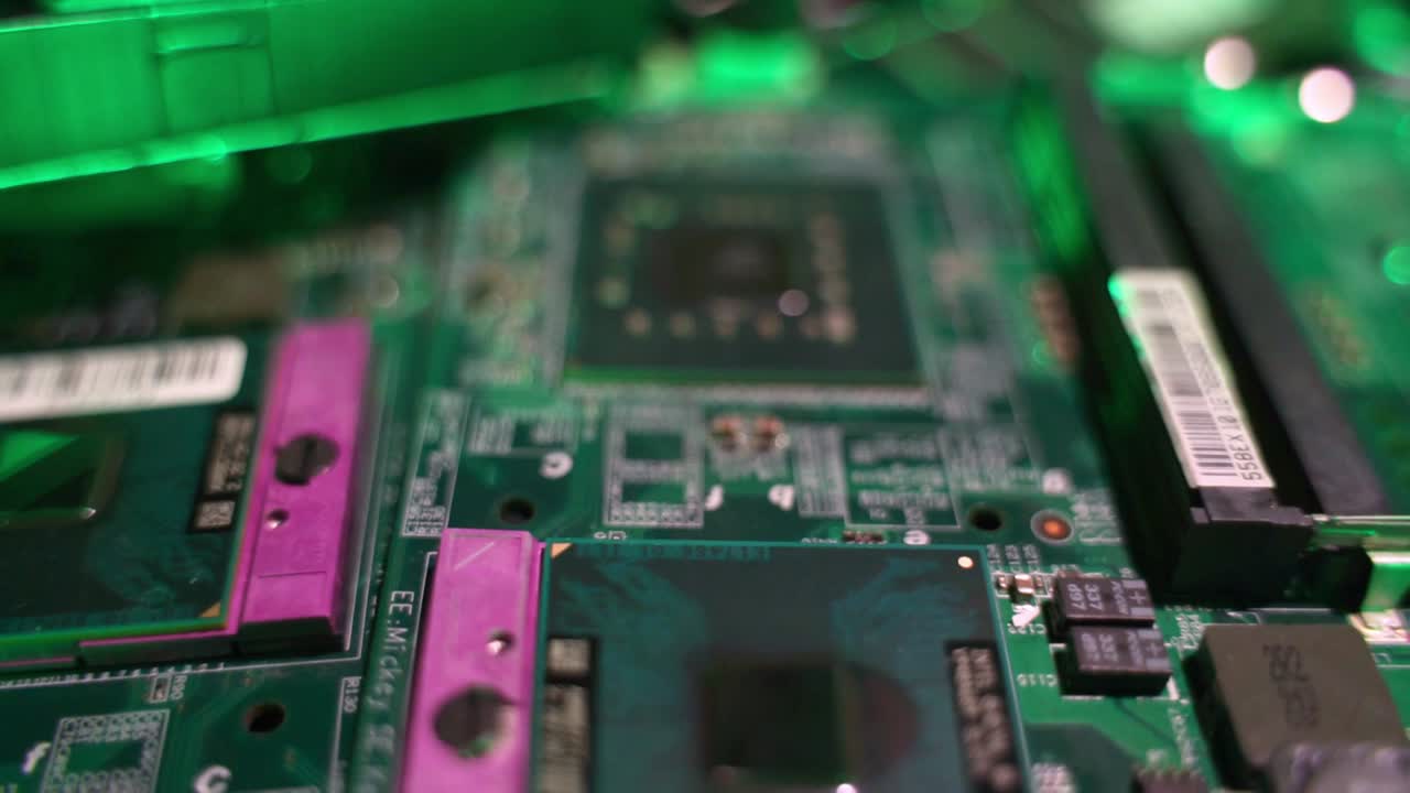 Slow motion macro shot of micro chips and electronic circuits