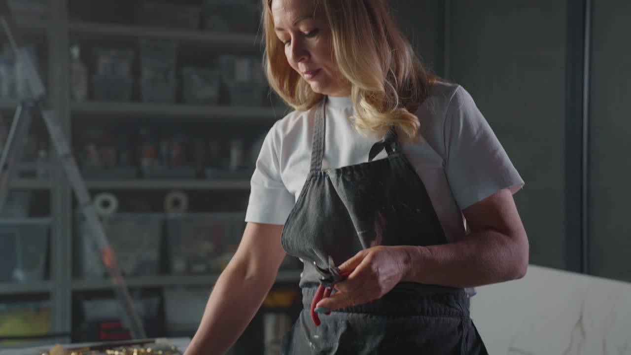 Woman Craftsperson Working on Jewelry Design