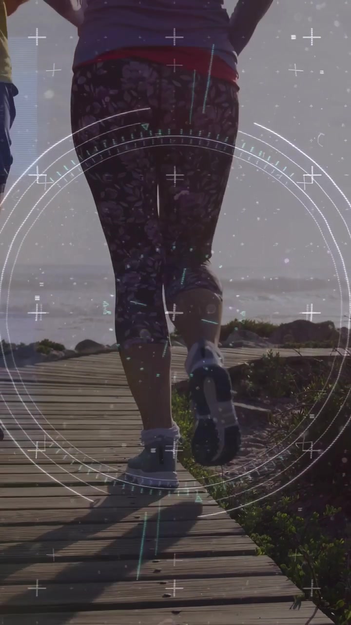 Vertical video: Woman stepping in, HUD scanning shoes on boardwalk as duo exercising for fitness