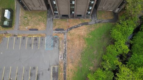 An-aerial-view-of-a-unique-building-with-many-square-skylights-on-the-roof-on-a-cloudy-day-on-Long-Island,-New-York