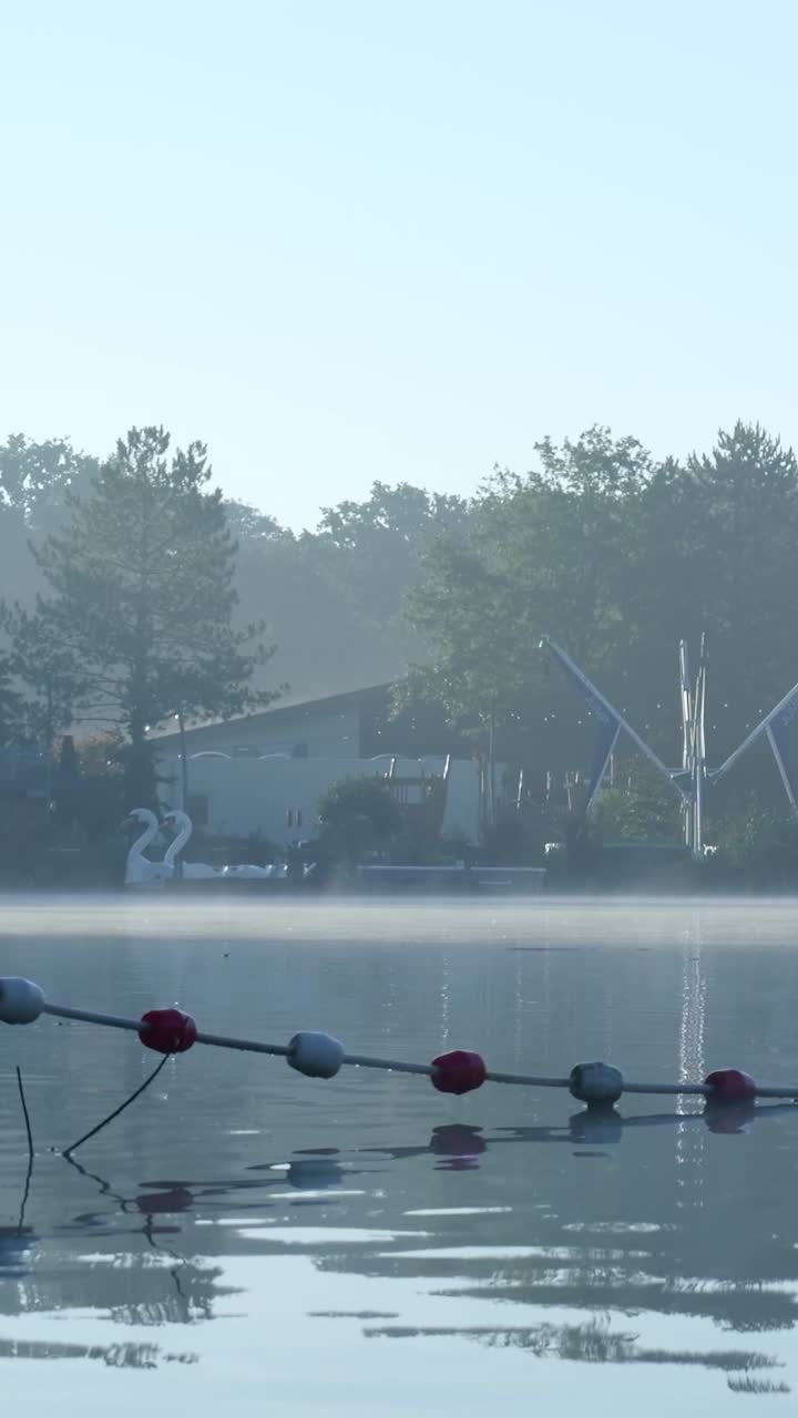 Early Morning Mist Over the Lake
