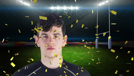 animation of confetti over caucasian male rugby player with ball at stadium