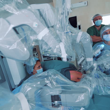 medical robot. robotic surgery. medical operation involving robot. minimally invasive robotic surgery with the da vinci surgical system.
