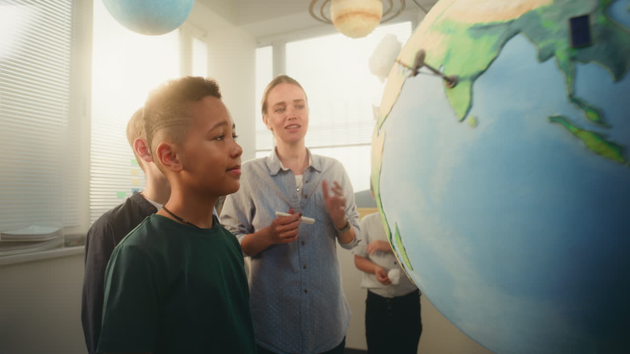 STEM Class on Renewable Energy Female Teacher Explaining Energy Resources to Elementary School