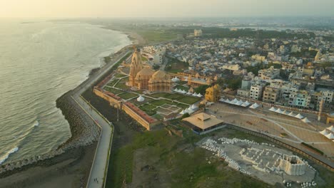 aerial view of a golden temple on the coast of india