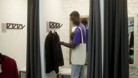 back view of african american man in a store