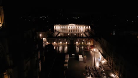 bordeaux city hall illuminated at night, france - aerial