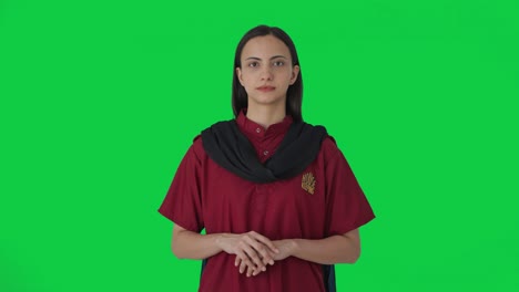 Indian-female-housekeeper-looking-at-the-camera-Green-screen