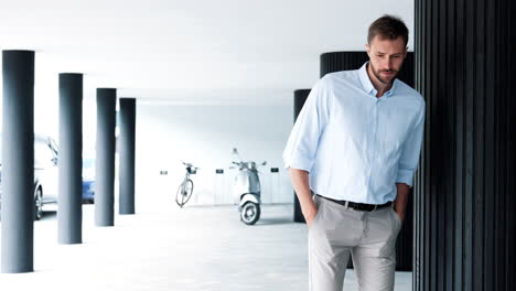 businessman in modern parking garage