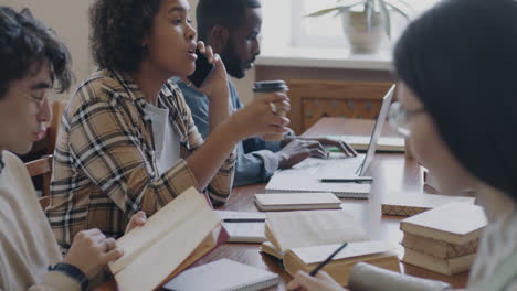 students studying in a library