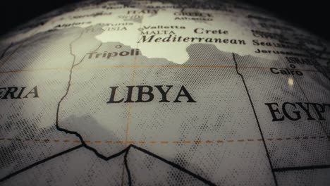 close-up of a world globe focusing on libya