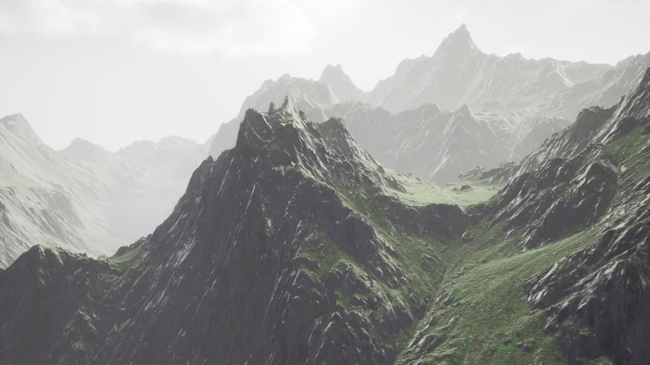 Majestic mountain peaks bathed in soft light during a serene morning