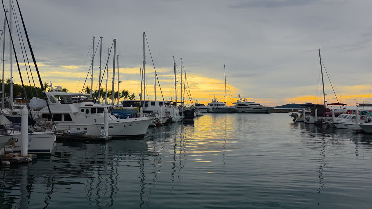 Private Charter Boats And Yachts At Sunset In Sutera Harbour, Kota Kinabalu, Sabah Borneo Malaysia. Static Shot