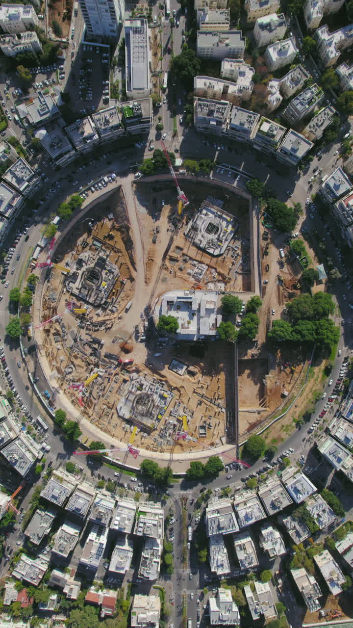 Vertical static shot over Kikar (square) Hamedina impressive project construction - tel aviv, israel