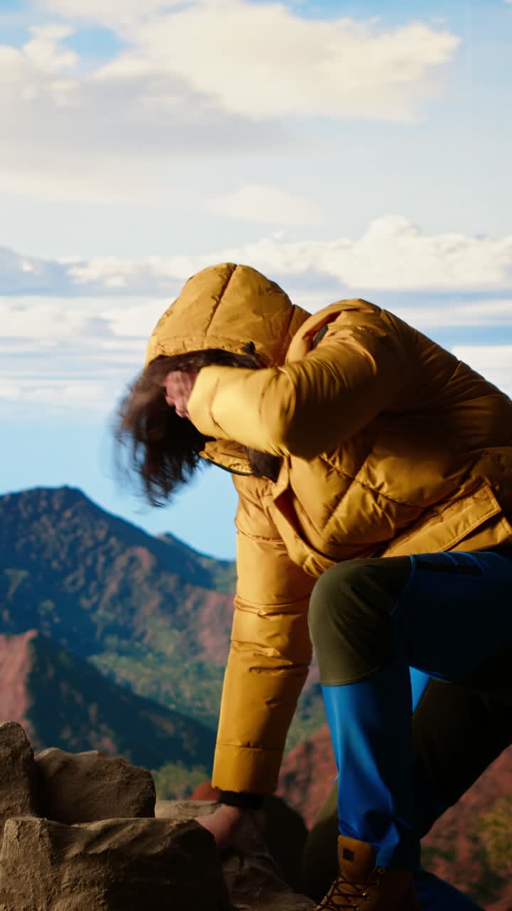 Man Climbing Mountain Peak with Scenic Landscape View
