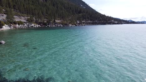 Aerial-Flyover-Of-Hidden-Beach-In-Lake-Tahoe-East-Shore