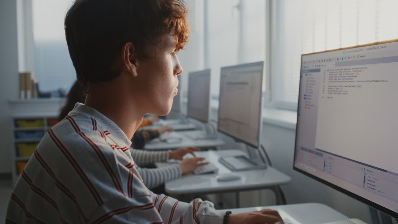 Group of Classmates In Bright Lab Learning Game Development and Modern Software Skills