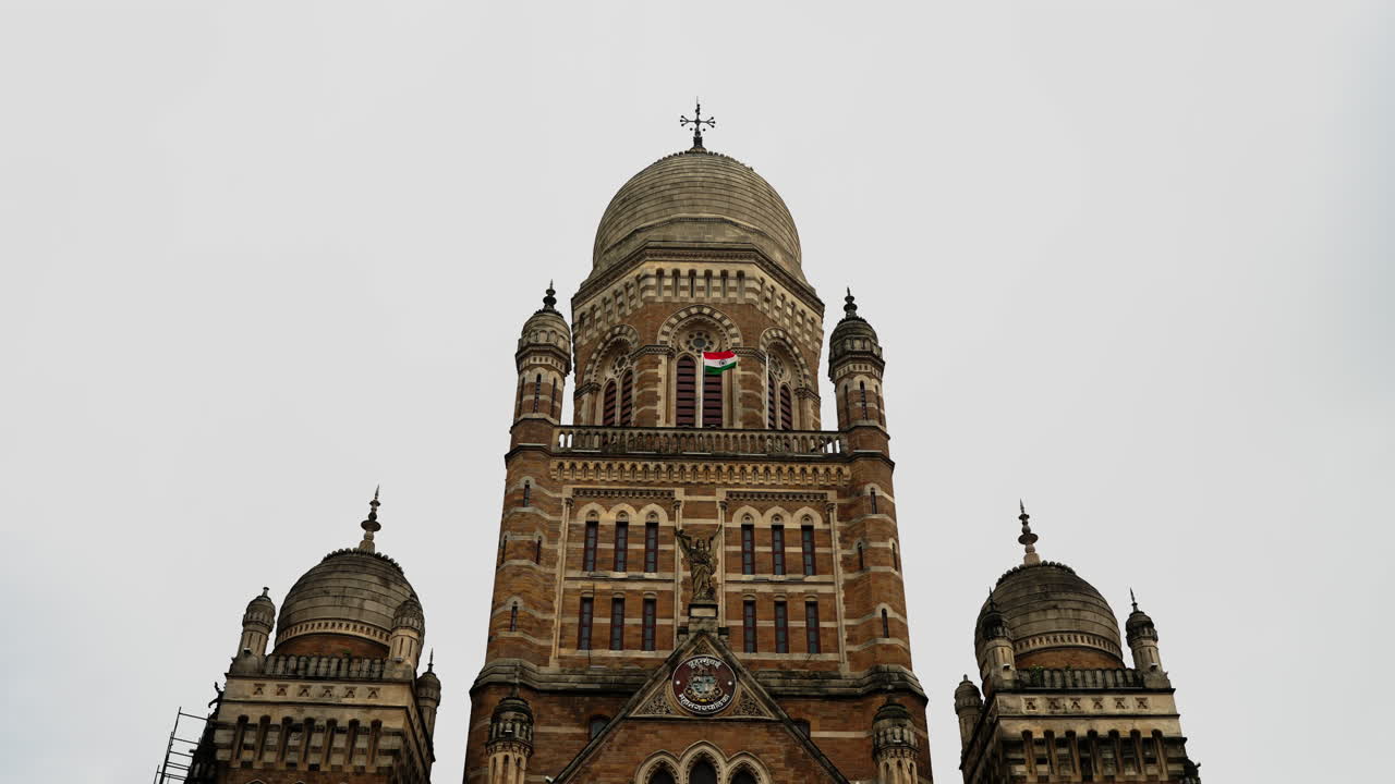 Historic Mumbai Municipal Corporation building showcasing Victorian Gothic architecture in South Mumbai. Iconic colonial-era landmark with ornate facades and domes. Perfect for India travel content