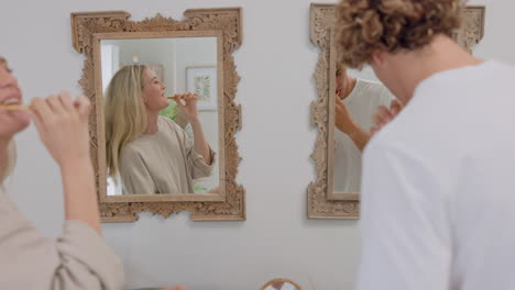 singing, playful and dance couple brushing teeth