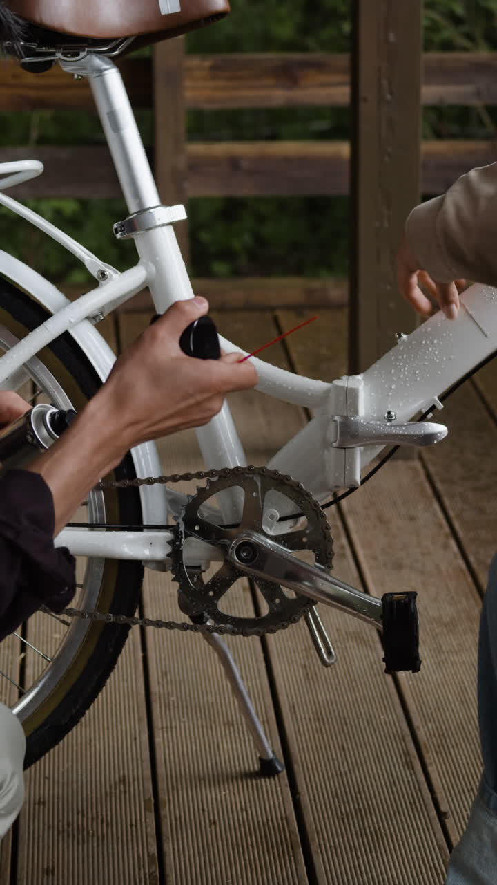 A bicycle chain being worked on