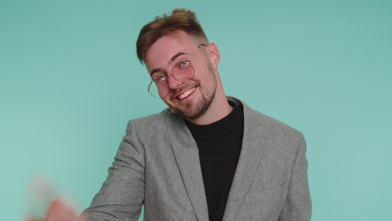 Man showing inviting gesture with hands ask to join beckoning to coming gesturing hello goodbye