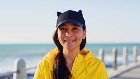 teenager, face and smile on a beach promenade
