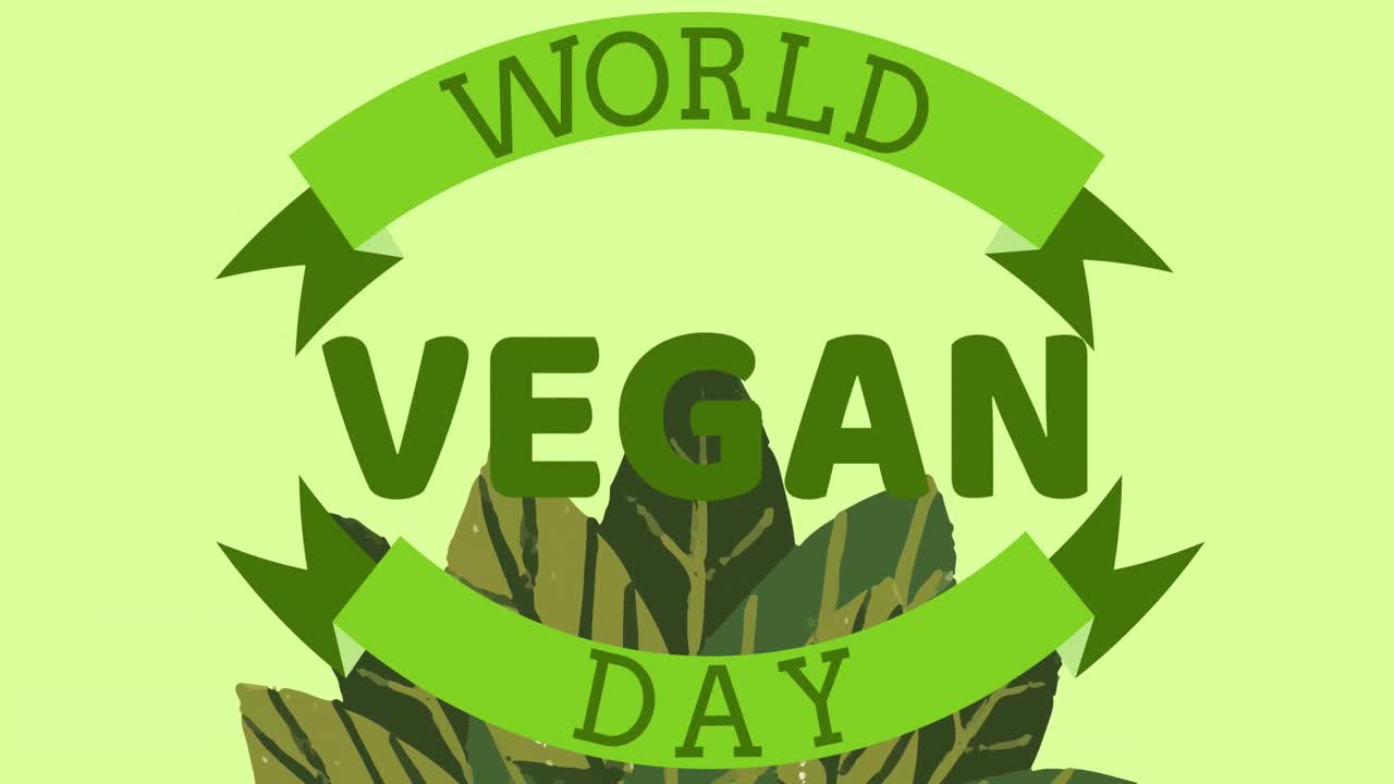 Animation von Text „Weltvegantag“ über Blättern