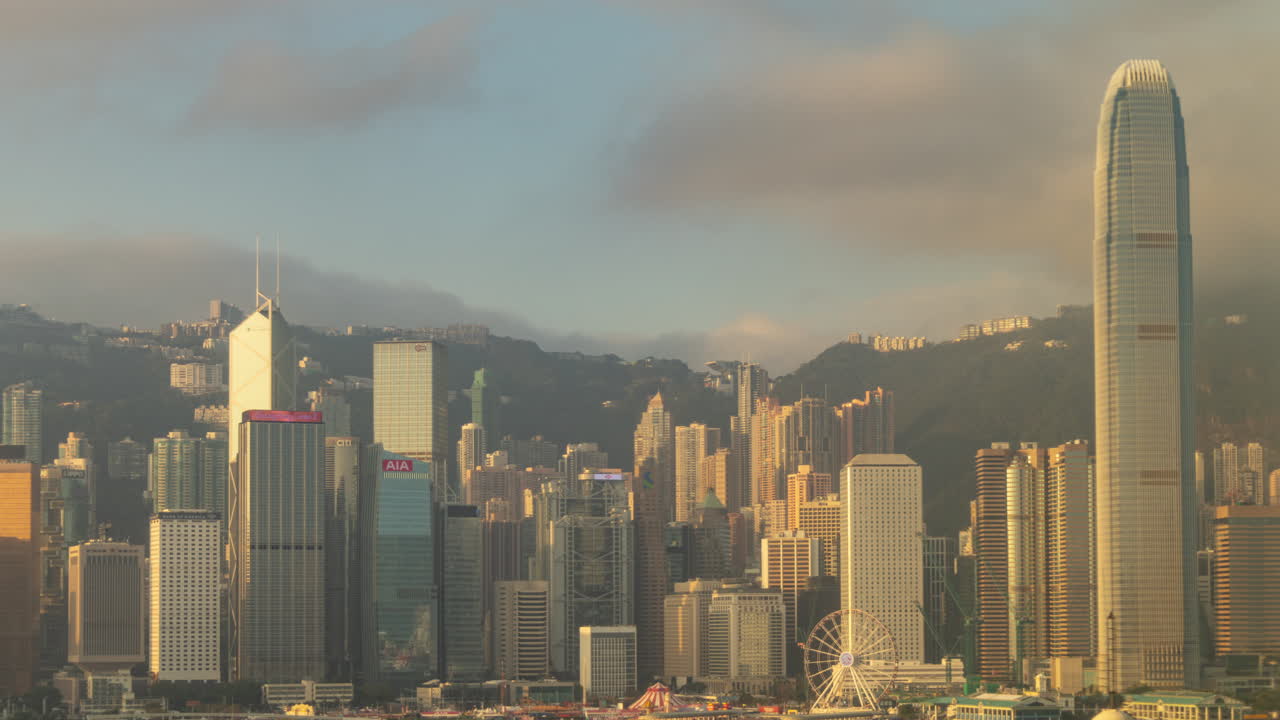 HONG KONG - 19 MARCH 2025 : Timelapse of the Hong Kong skyline and victoria harbour from a high vantage point