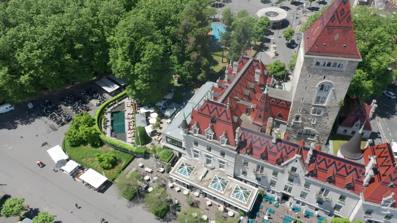 Dynamic aerial of the Chateau d'Ouchy Hotel in Lausanne, Switzerland