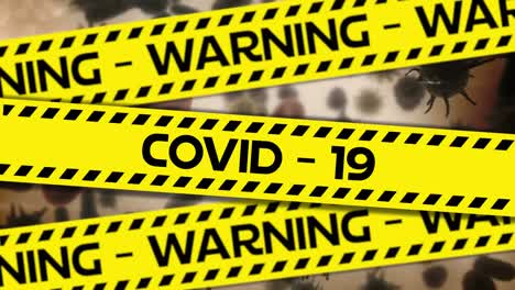 yellow police tapes with warning and covid-19 text against covid-19 cells moving