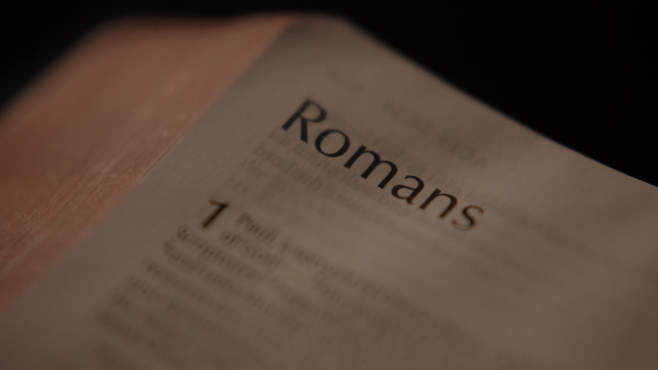 Close-up of the Book of Romans in a Bible