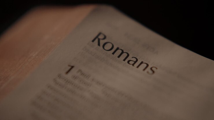 Close-up of the Book of Romans in a Bible